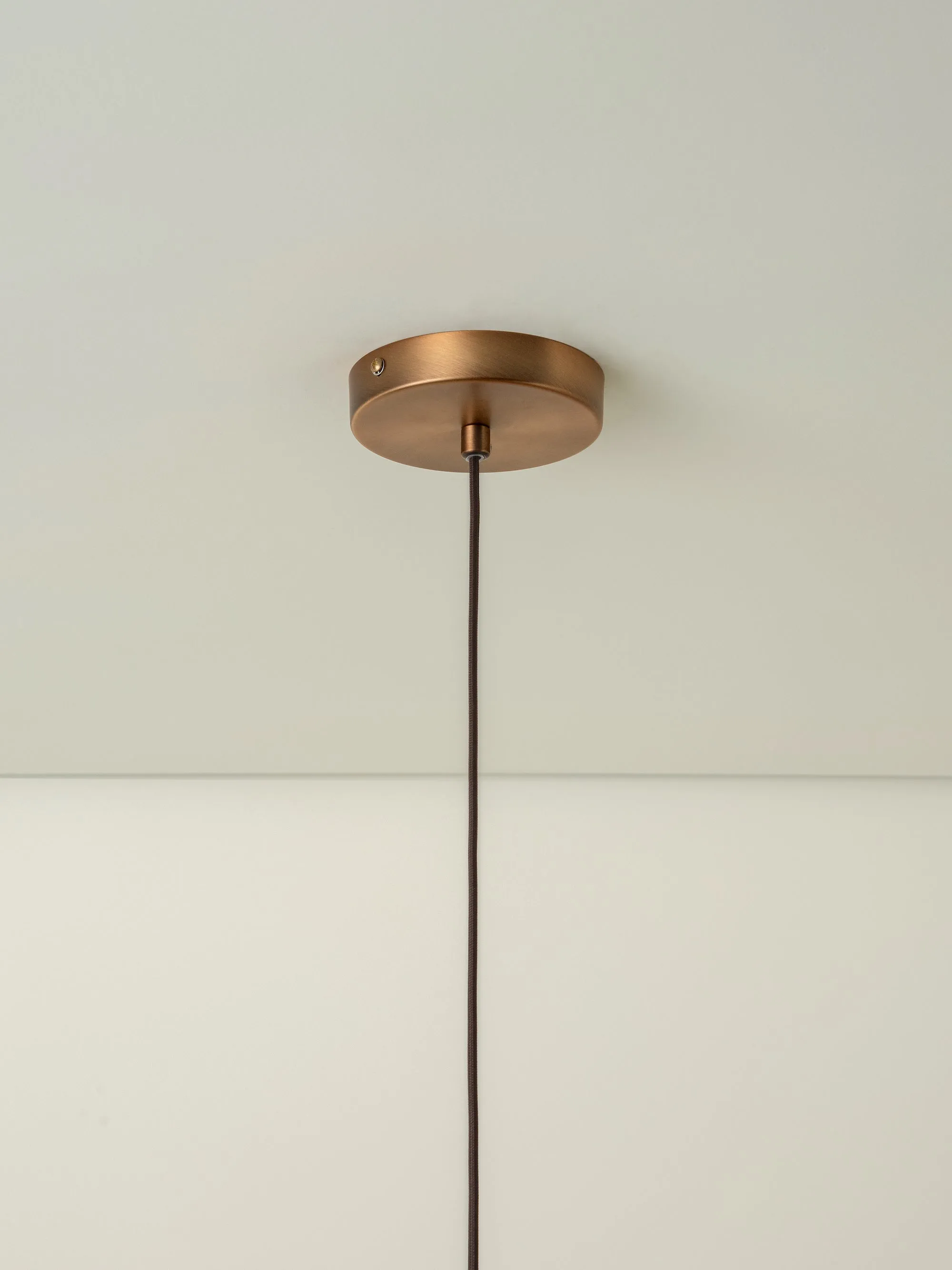 Ridotti - 1 light natural raffia and burnished brass pendant